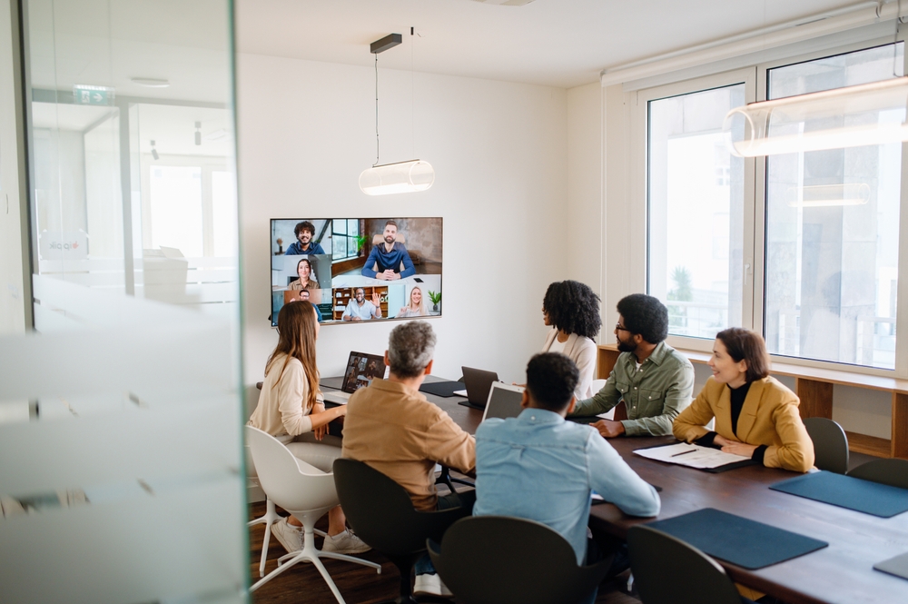Team Working In Hybrid Collaboration Room